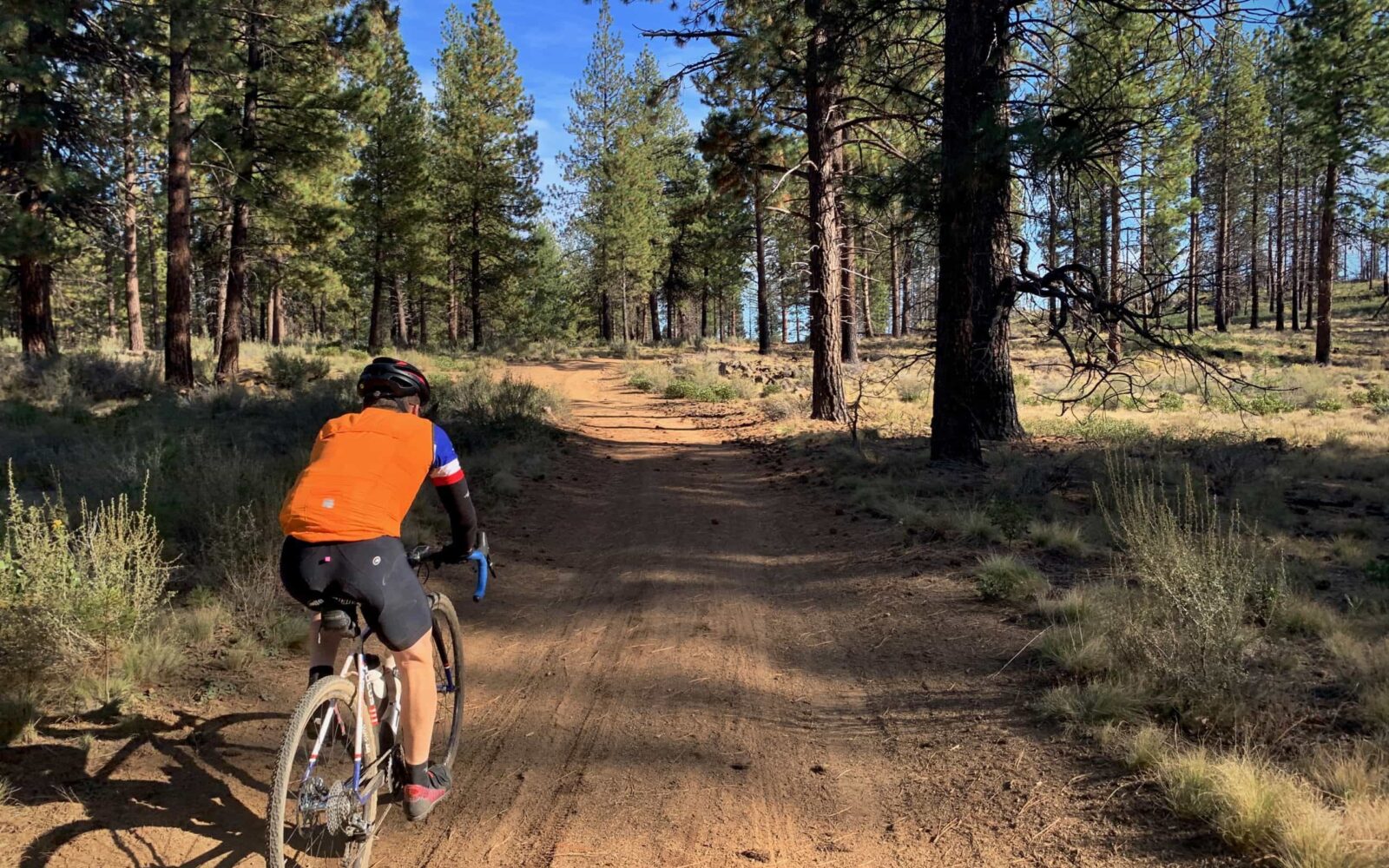 Riding gravel trail in forest in Bend Oregon