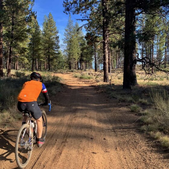 Riding gravel trail in forest in Bend Oregon