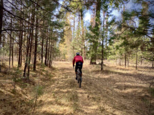 Cyclist on the Larch Loop in the Metolius Preserve.