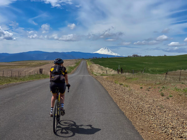 Mt Hood in background, cyclist in foreground