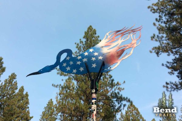 Flaming chicken sculpture on Phils trail in Bend Oregon