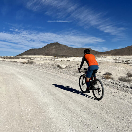 Riding a bike through Ash Meadows.