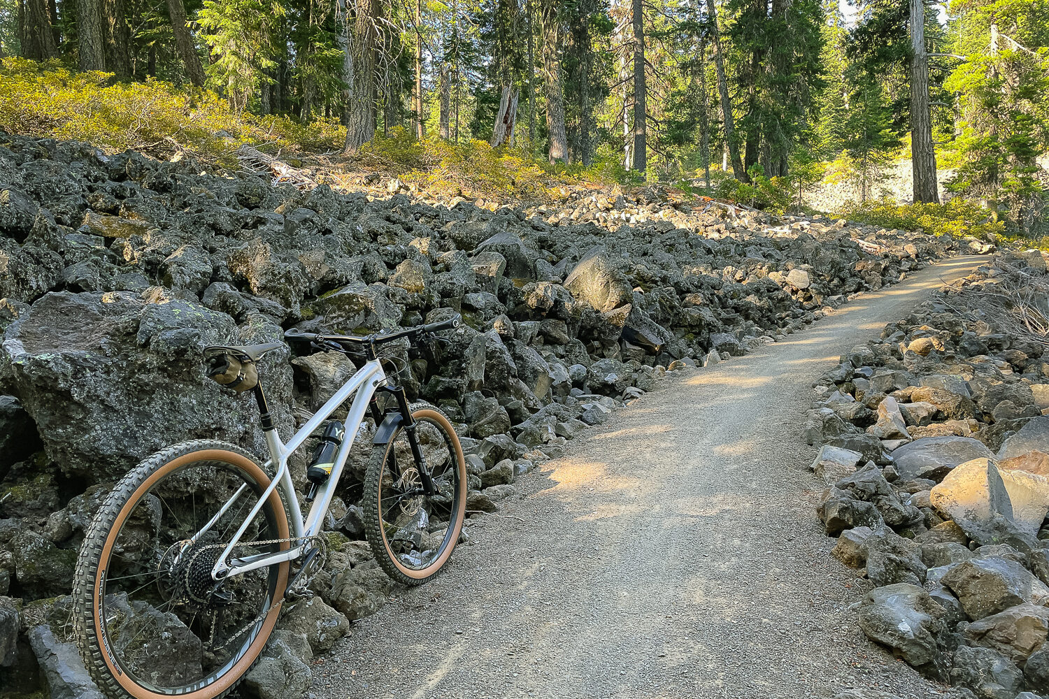 gravel bike trail through fields of lava flow