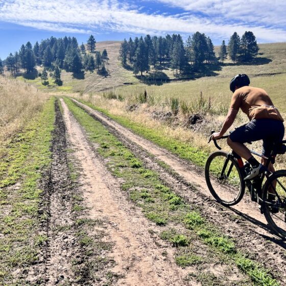 Riding a rutted dirt road near Wallowa, Oregon.