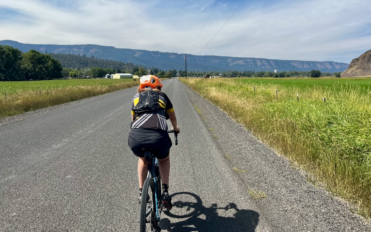 Gravel Girl on paved road.