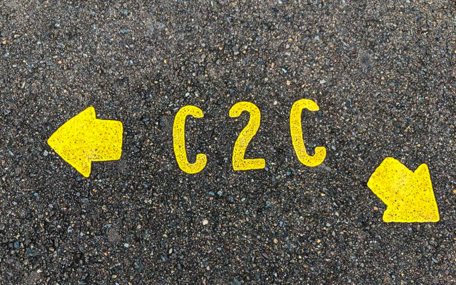 CTC painted text on paved trail