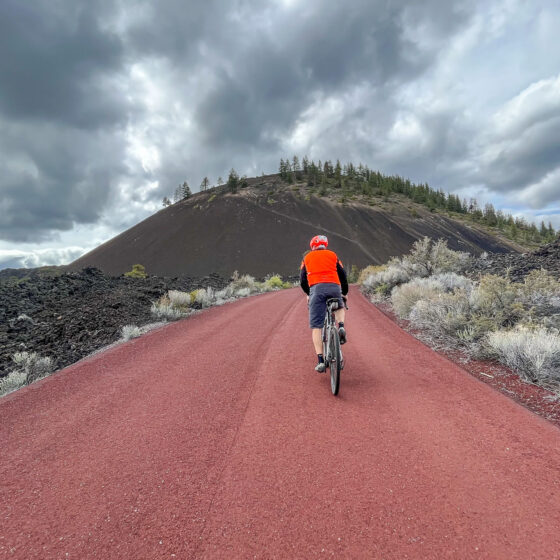 Riding up Lava Butte on gravel bike.