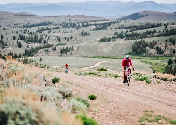 Gravel cyclist on dirt road in Colorado.