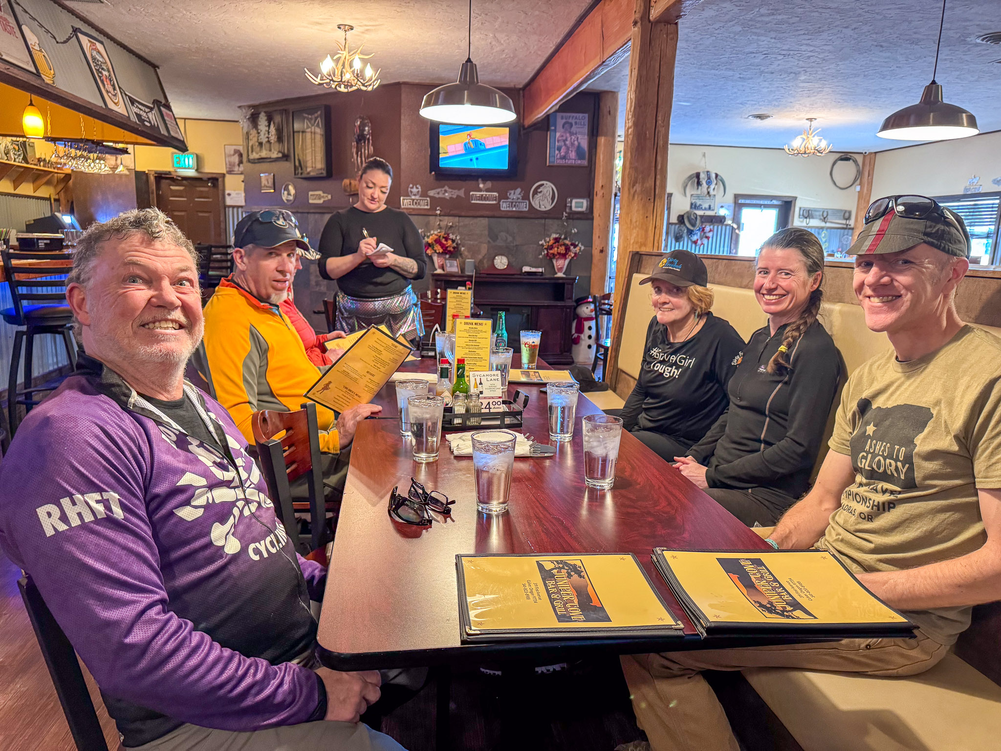 Placeholder: gravel riders socializing together after a community ride.
